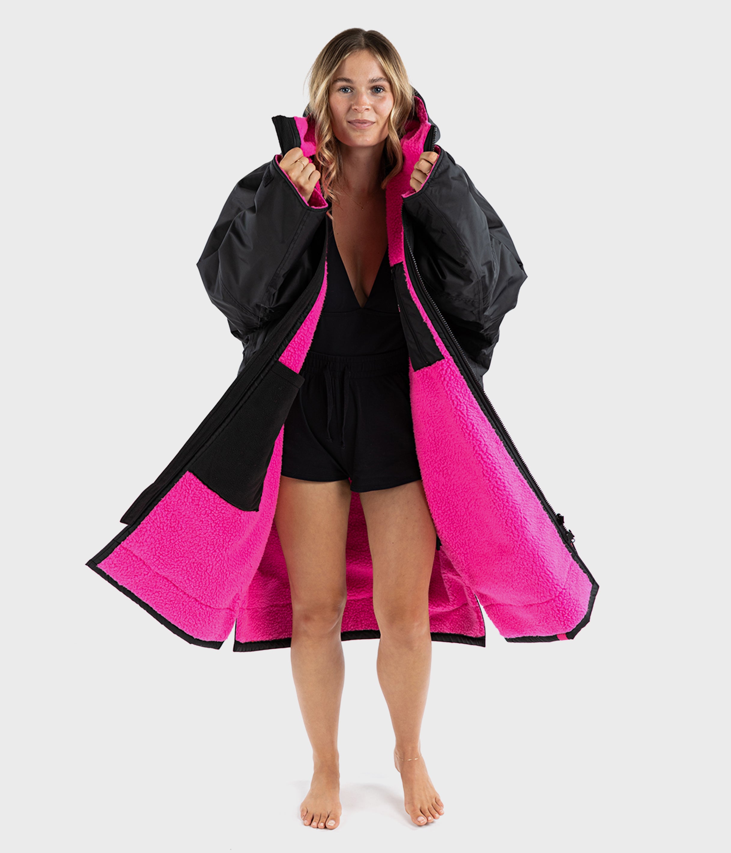 dryrobe Advance Long Sleeve | Black/Pink modelled showing cosy pink lining