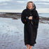 Zone3 Heat Tech Recycled Change Robe Parka on beach closed
