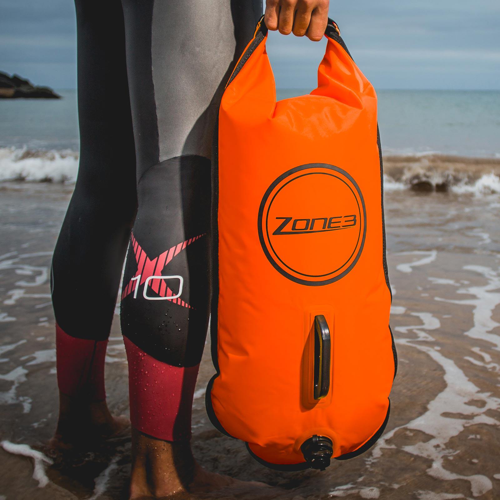 Zone3 Swim Buoy Dry Bag 28L | Orange on the beach