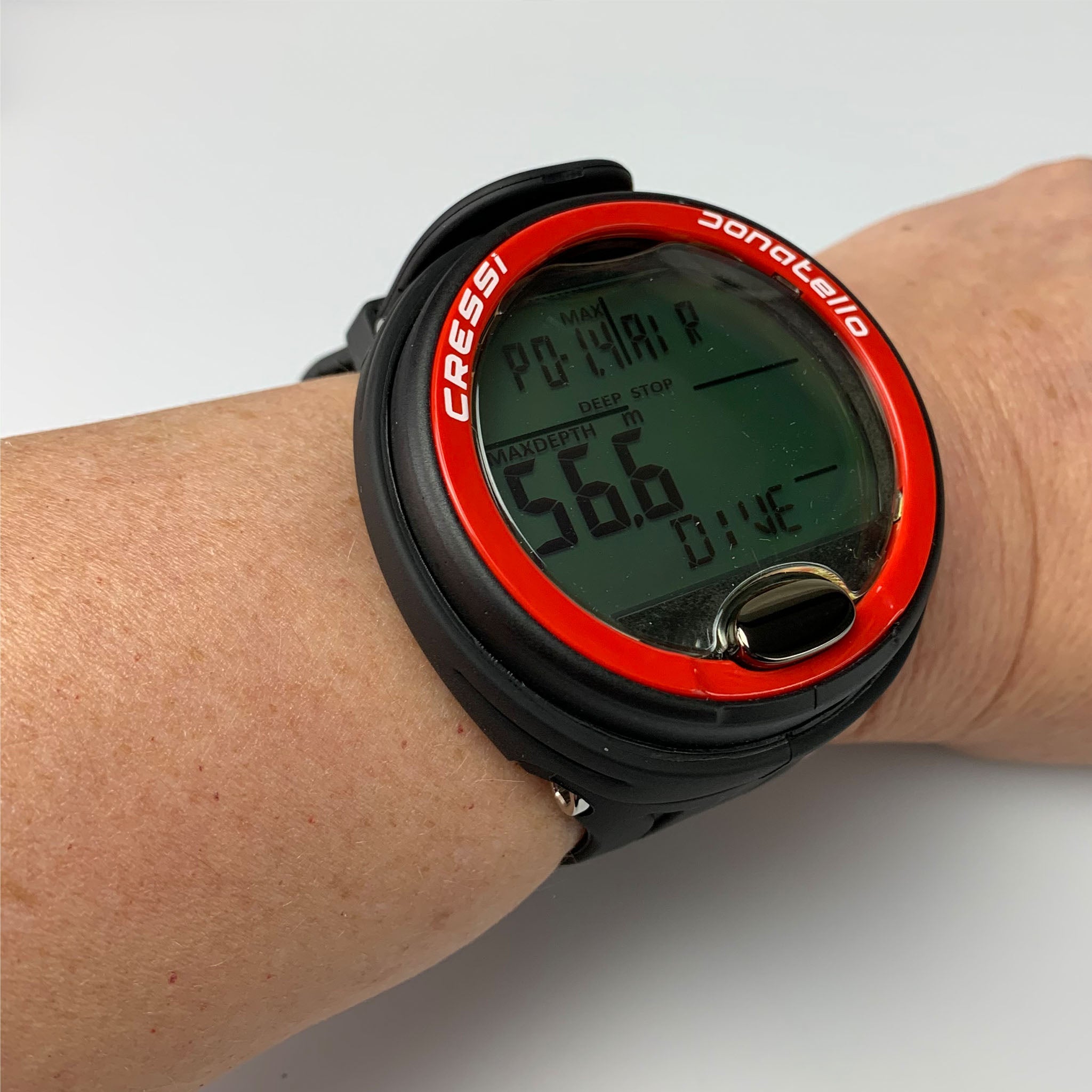 Cressi Donatello Diving Computer in Red on wrist