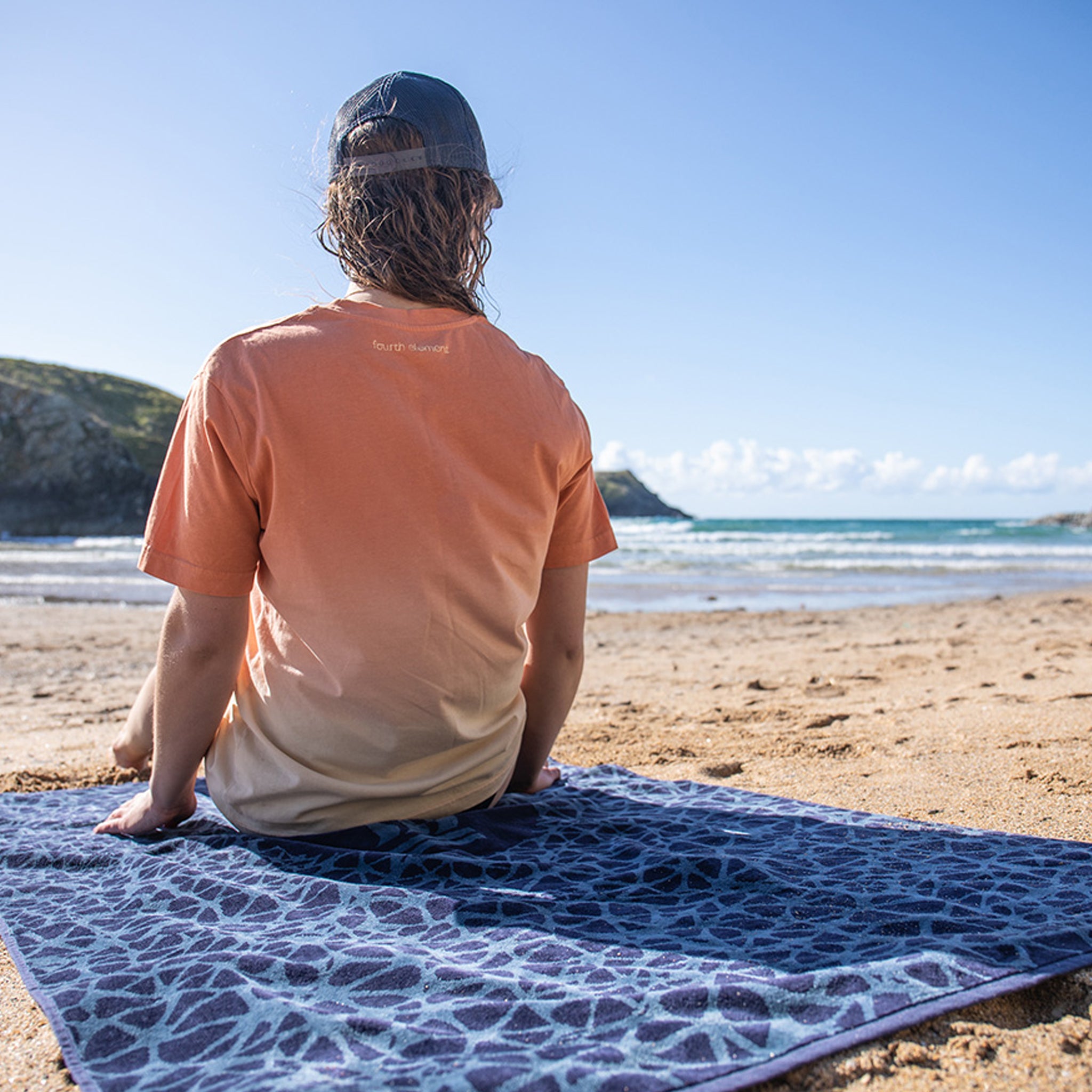 Fourth Element OceanPositive Beach Towel | on Beach